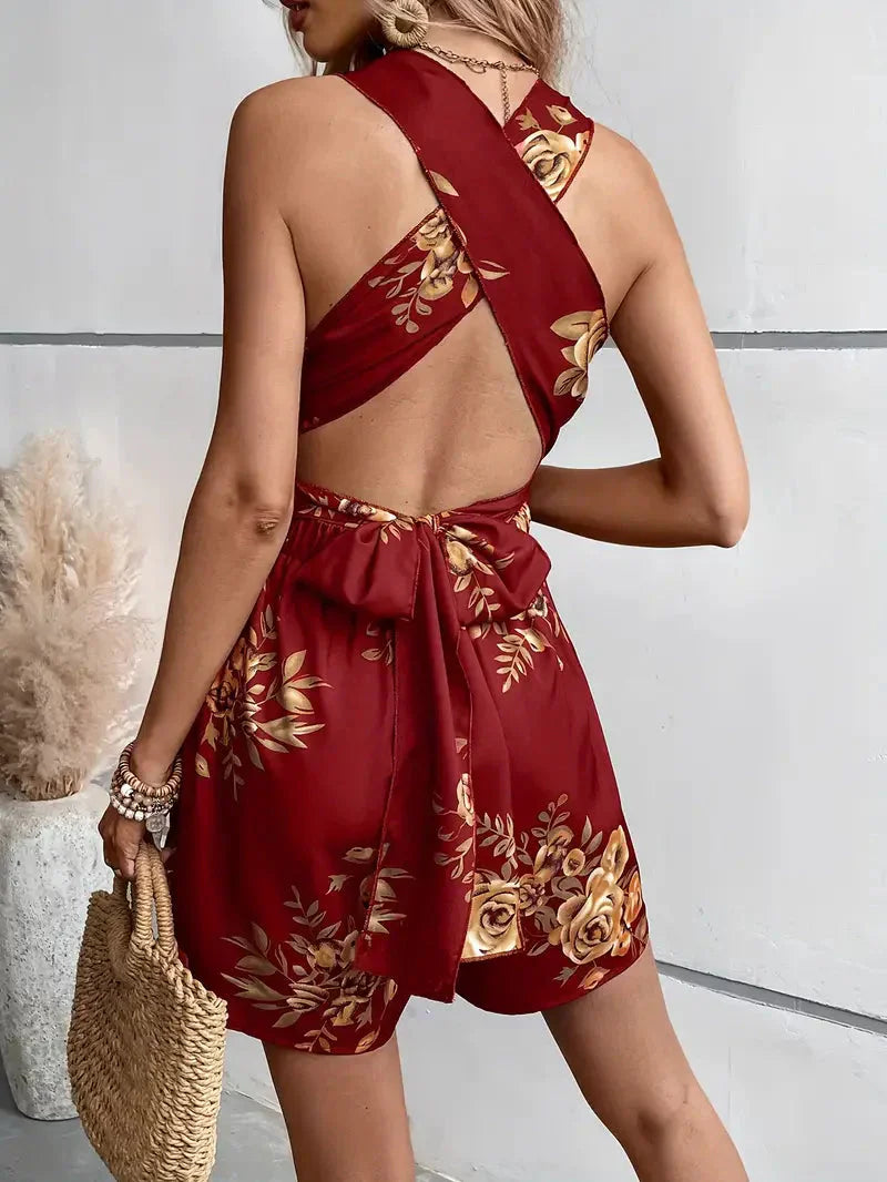 Women’s Sleeveless Mini Jumpsuit with V Neckline Cross Back Straps and Tie Waist