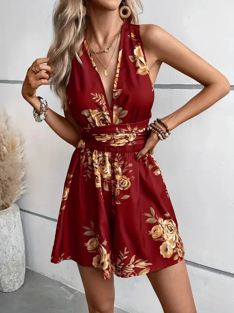 Women’s Sleeveless Mini Jumpsuit with V Neckline Cross Back Straps and Tie Waist